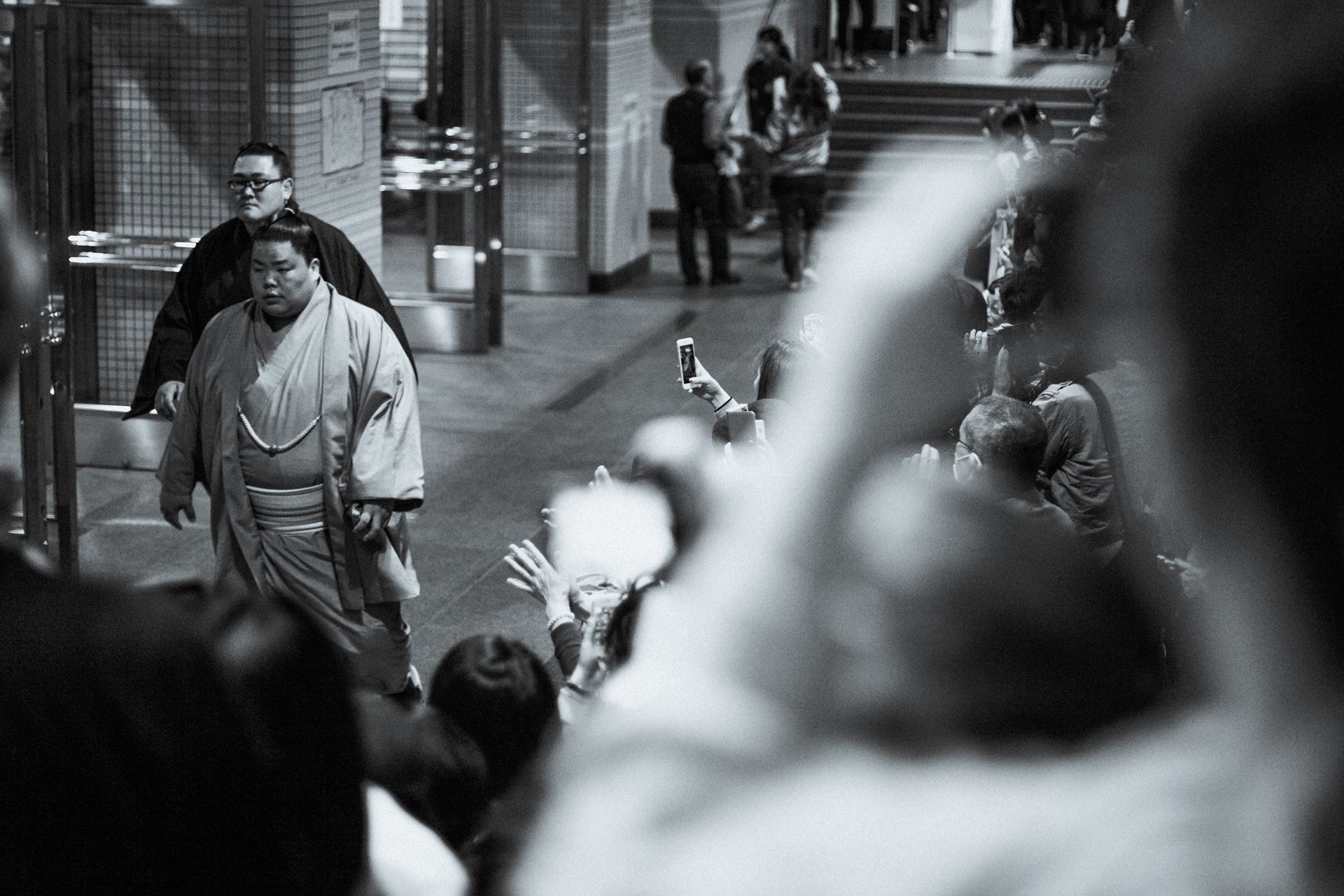 Daieishō Hayato et al. standing around a fire hydrant